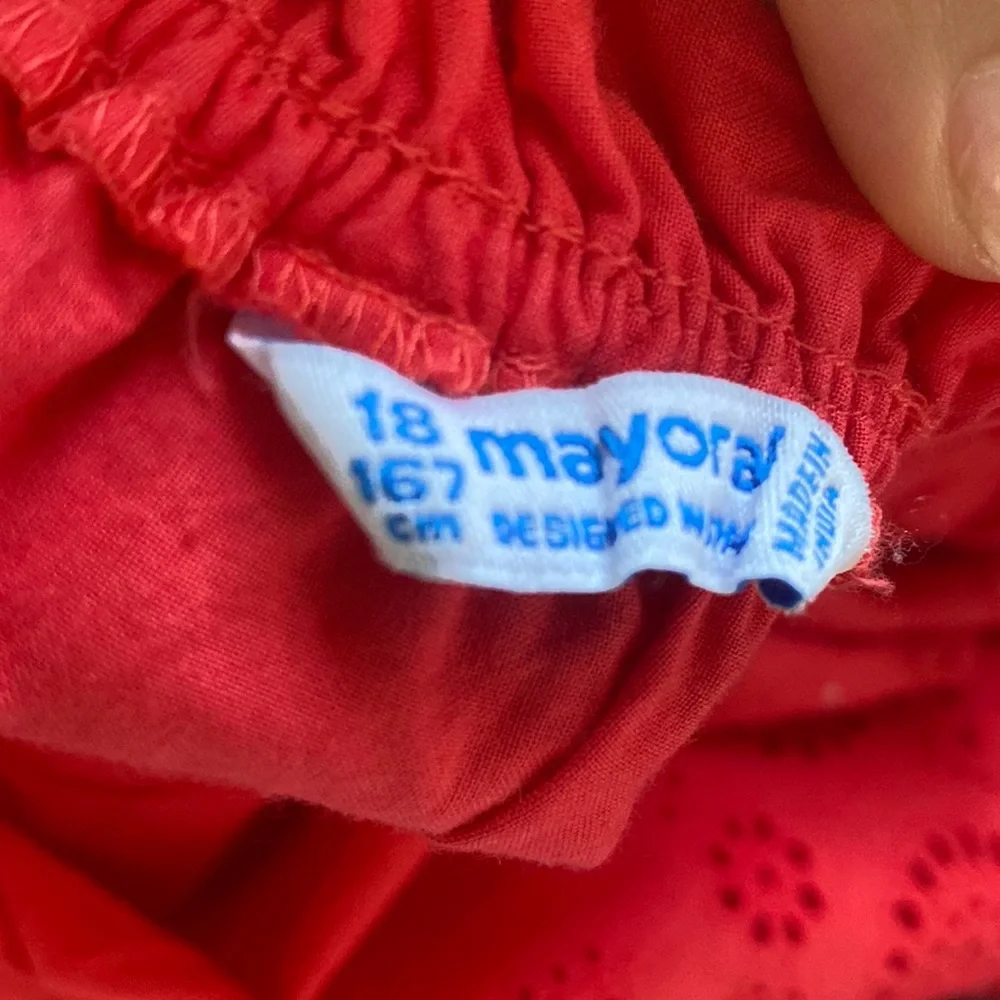 Red dress with designs on bottom and some at top - Picture 3 of 4